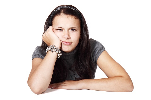 Female student looking bored.